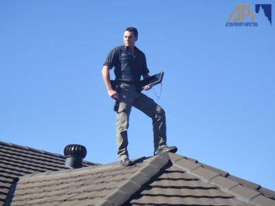 Inspecting Roof Exterior