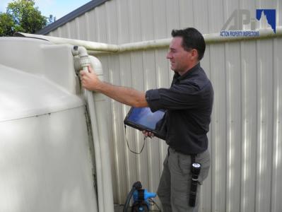 View Photo: Inspecting Water Tank