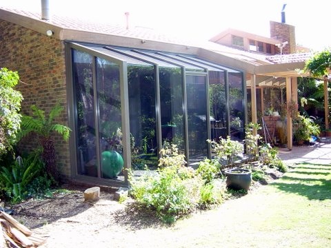 View Photo: Commercial Aluminium Hooded Garden Window Replacement