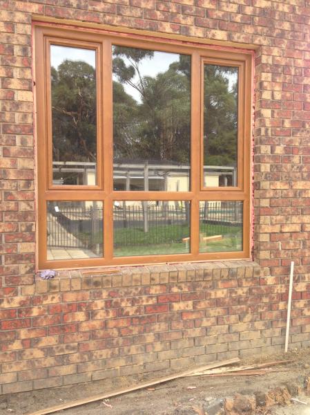 Double glazed window with 'woodgrain' finish