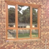 Double glazed window with 'woodgrain' finish