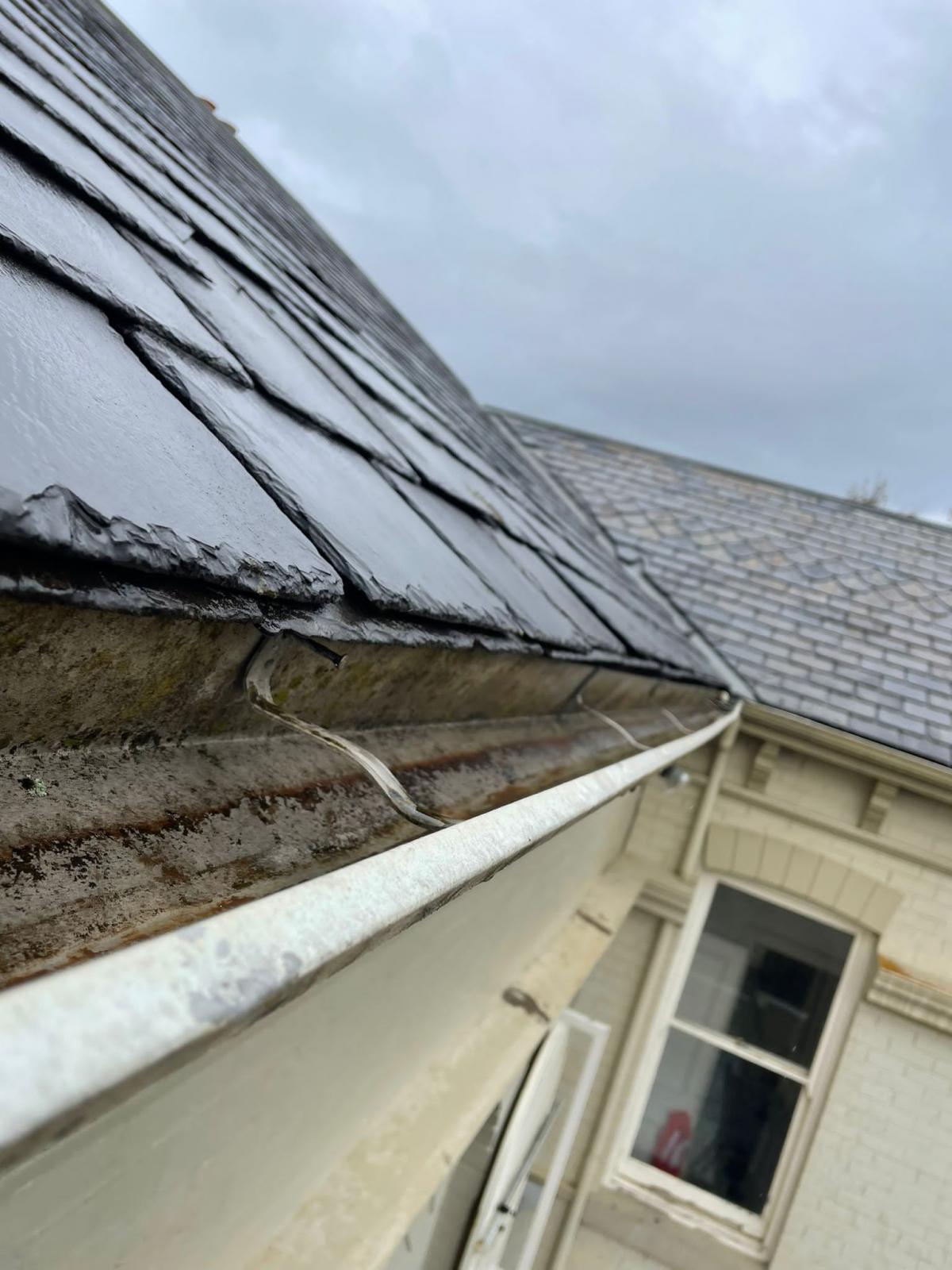 Gutters on slate roof cleared