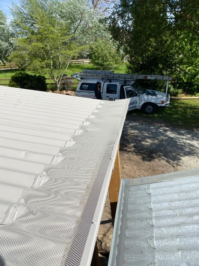 View Photo: Grayson’s ScrewTight Full-Metal gutter guard on corrugated roofing in Victorian bush.