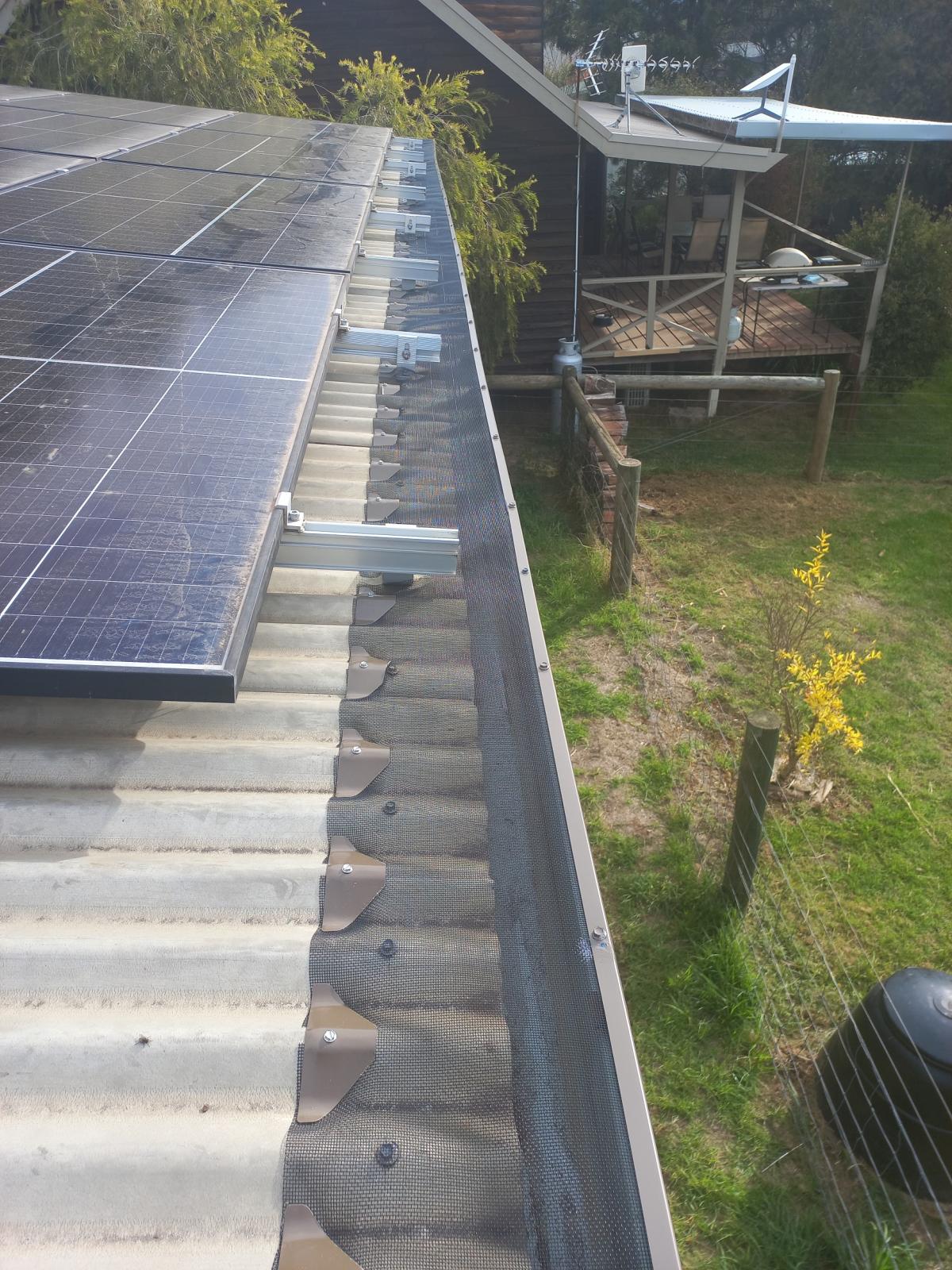 View Photo: Gutter Guards around solar panels