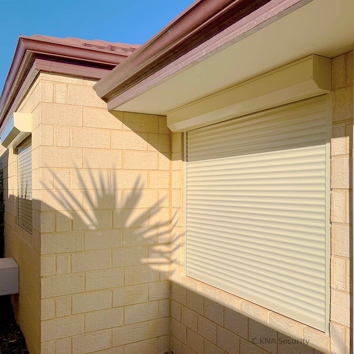 Cream electric roller shutters installed in Perth