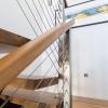 Timber handrail on wire balustrade