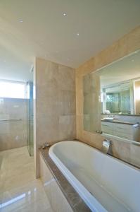 View Photo: Marble Tiled Bathroom