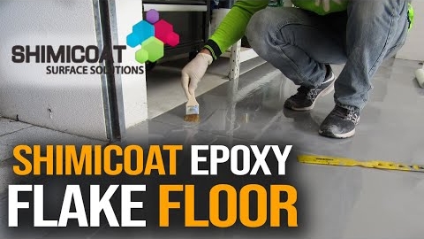 Watch Video: DIY Epoxy Flake Garage Floor