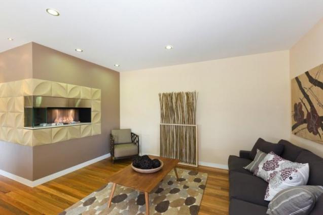 View Photo: Modern Fireplace Setting and Timber Flooring