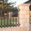 Limestone Pillar and Decorative Wrought Iron Fence